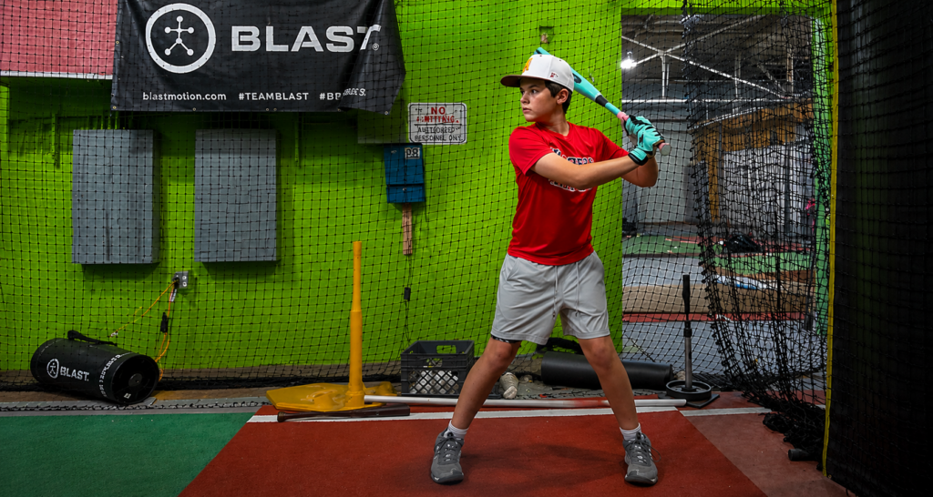 Youth baseball athlete in batting stance at 365 Baseball & Softball, San Rafael